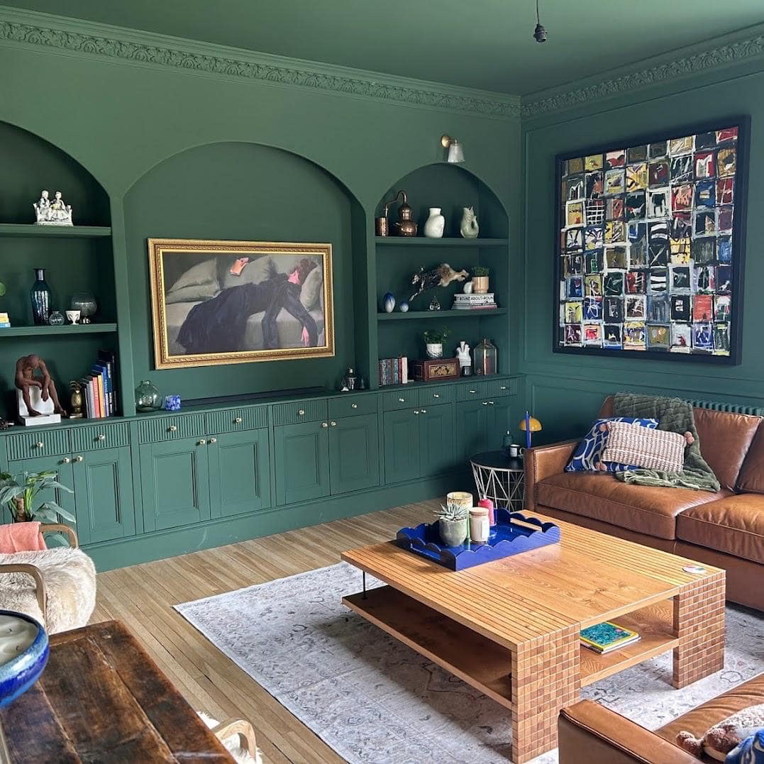 Bespoke media wall and living room with arched joinery by Constructs